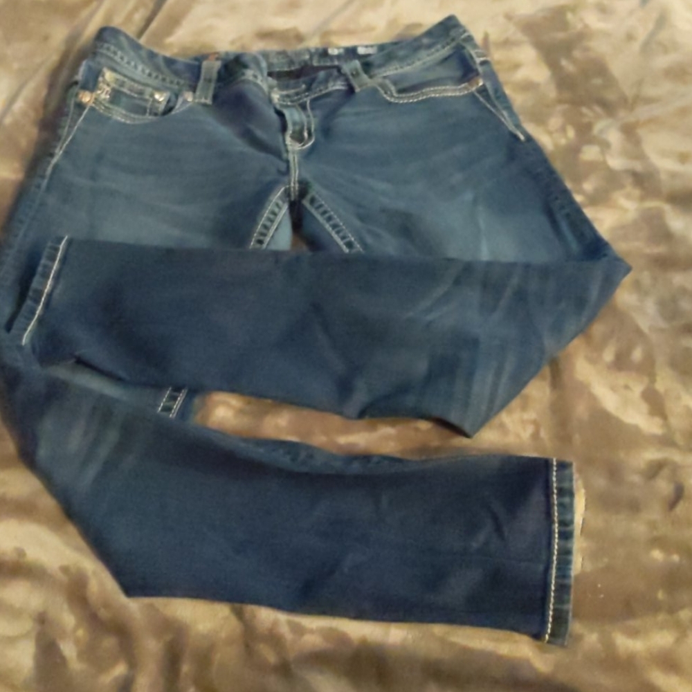 Skinny mid rise jeans size 31